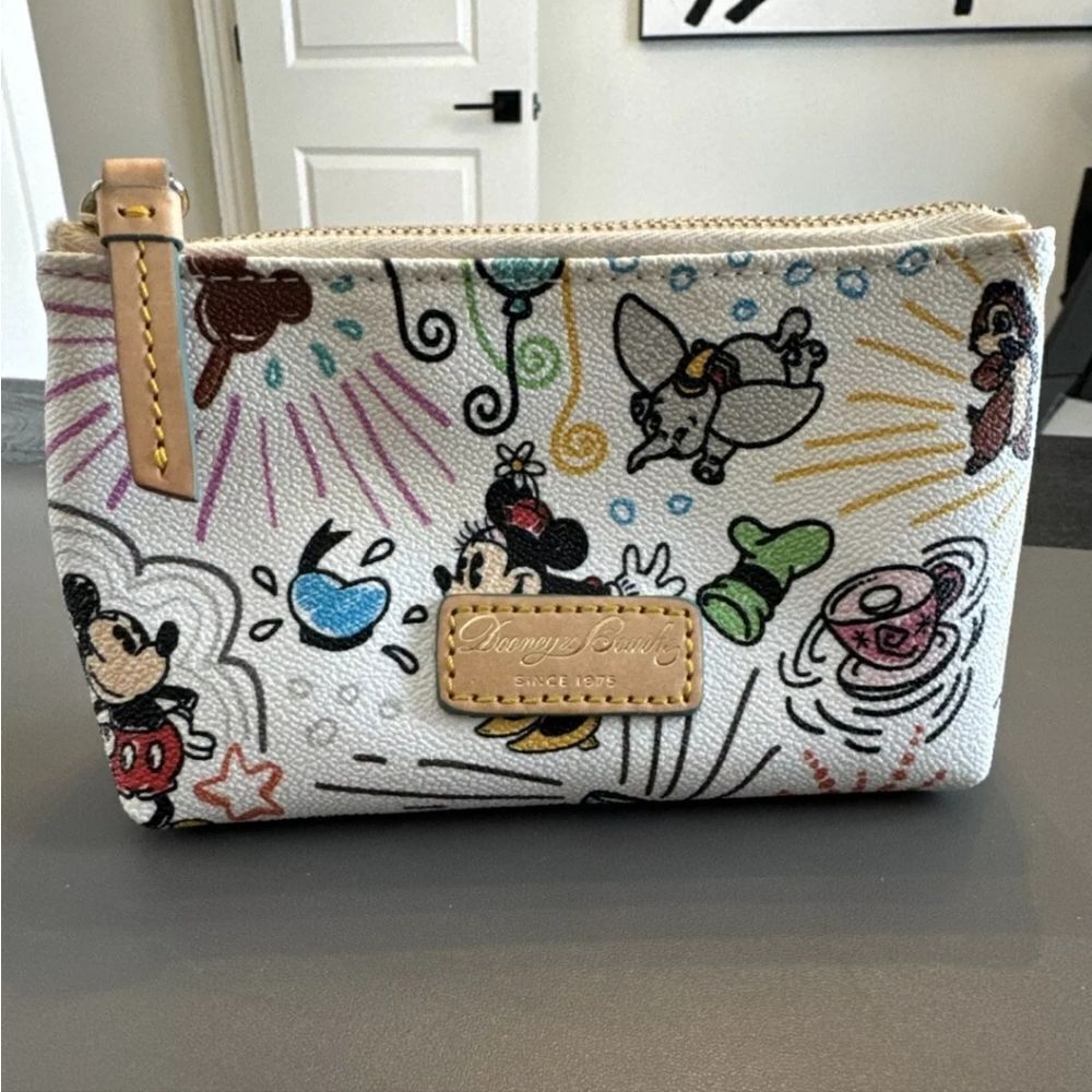 Dooney & Bourke Disney Sketch Makeup Bag gently used great condition